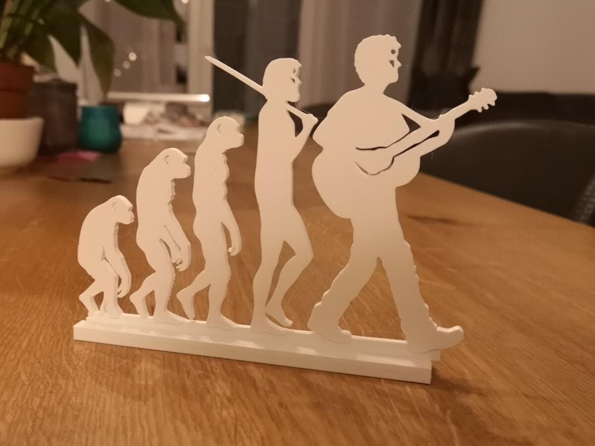 Escultura Artesanal Evolução do Guitarrista