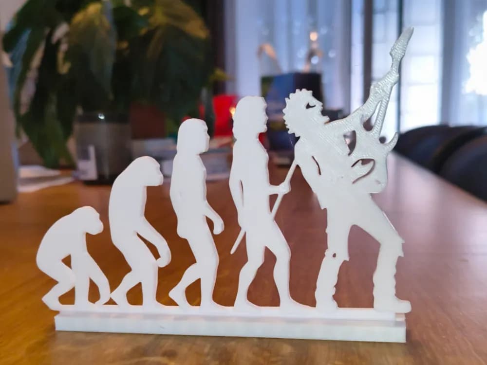 Escultura Artesanal Evolução do Metal