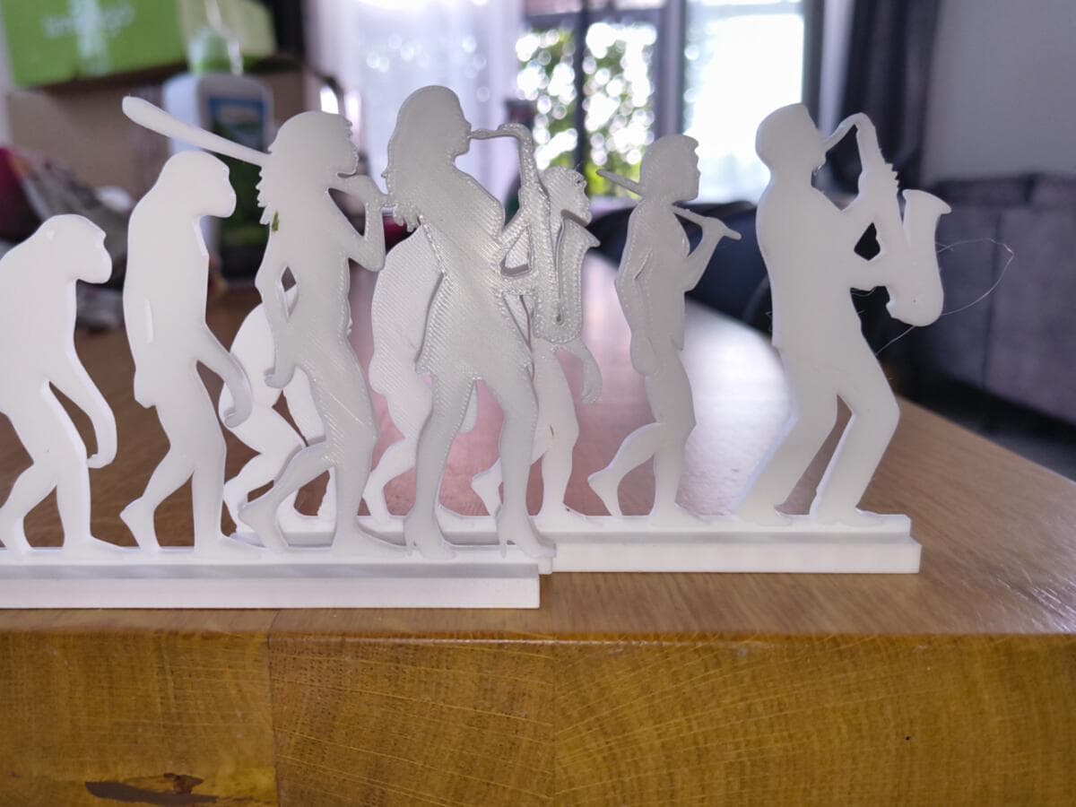 Escultura Artesanal Evolução do Saxofonista